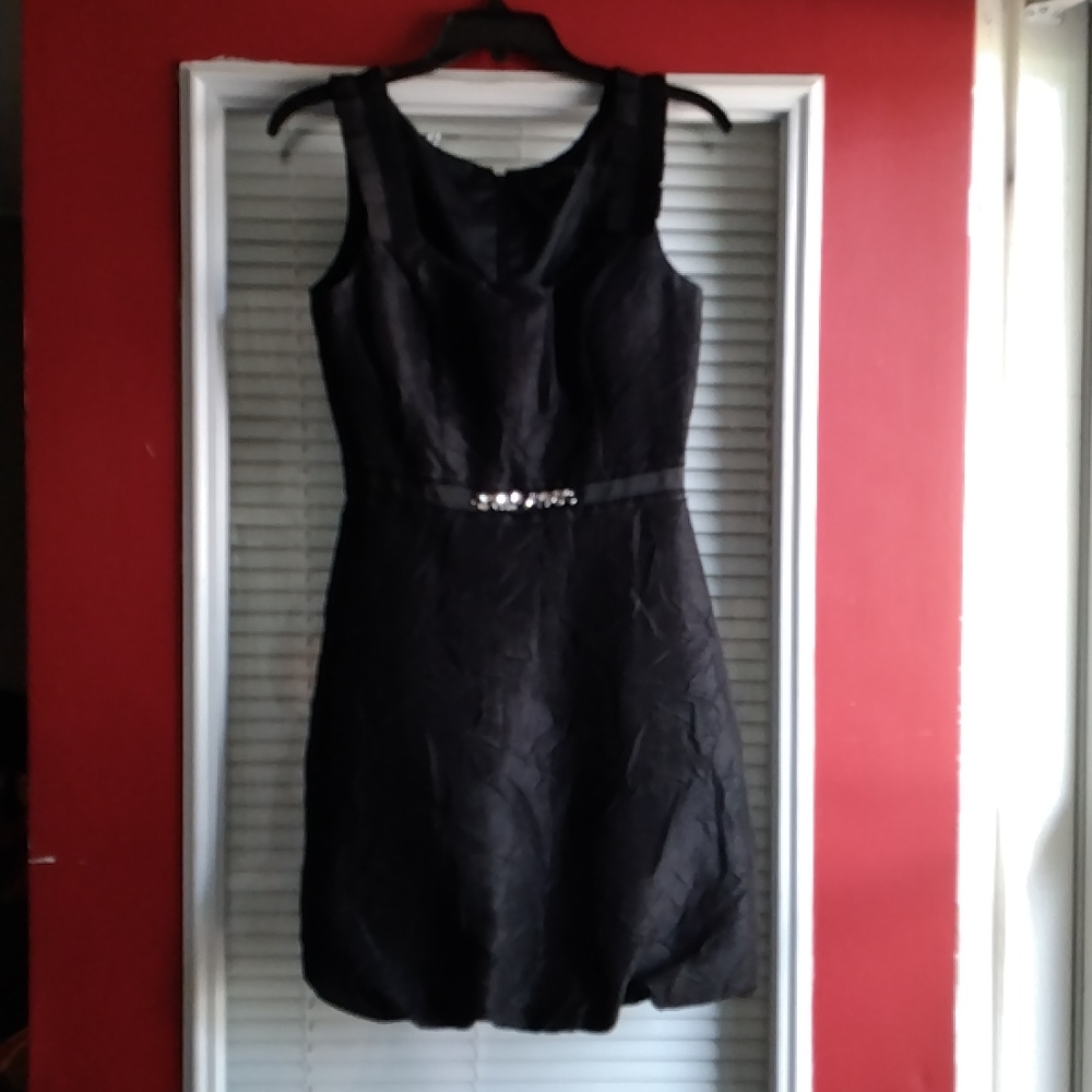 It is Max and Cleo evening dress size 4 with rhinestones on the front it